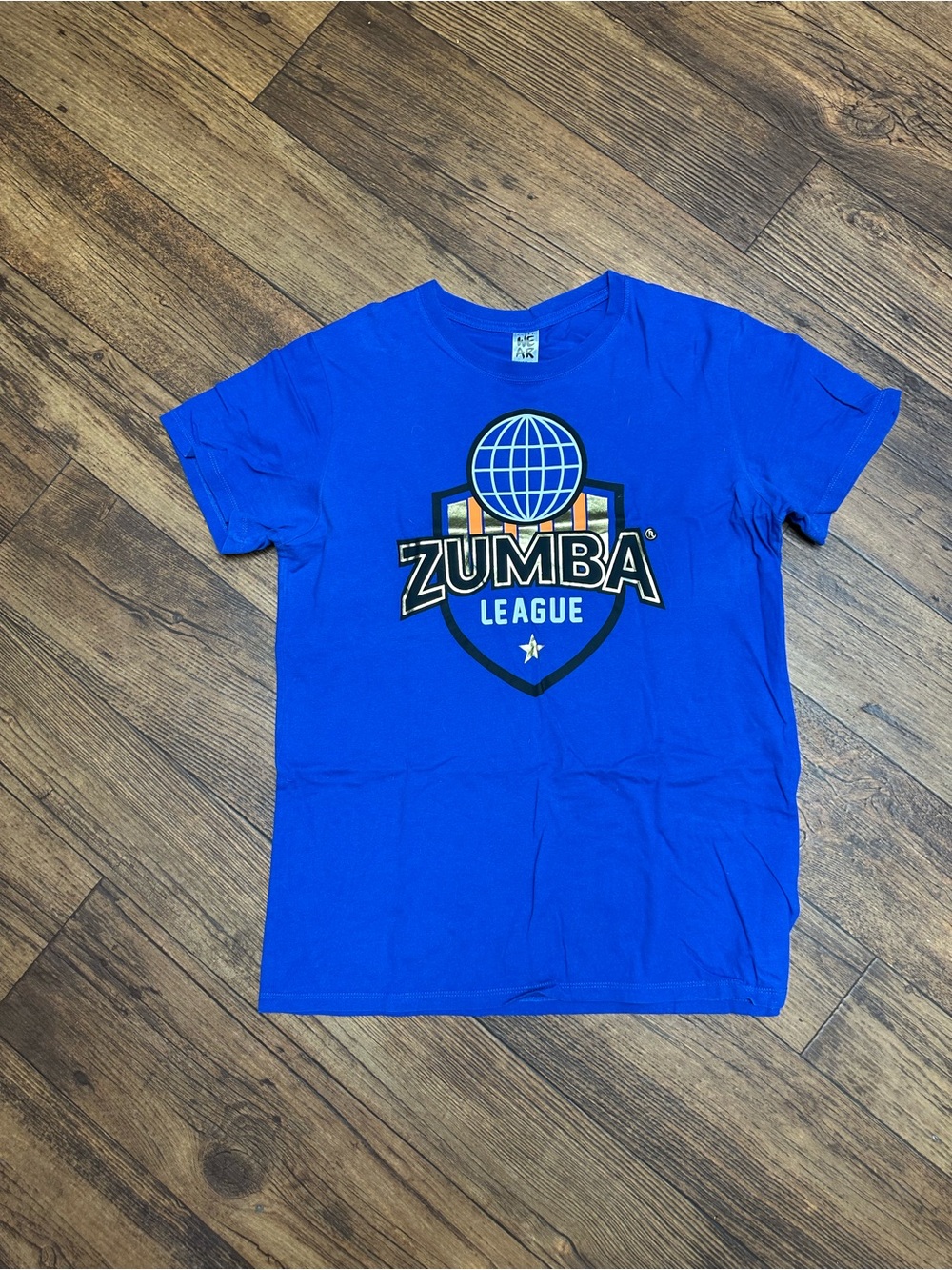 Zumba Fitness instructor T‑Shirt in Bright Blue with Shield Logo